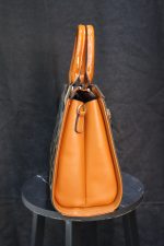 Chic Leopard Print Handbag with Glossy Finish - Image 4