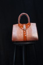 Orange crocodile effect bag